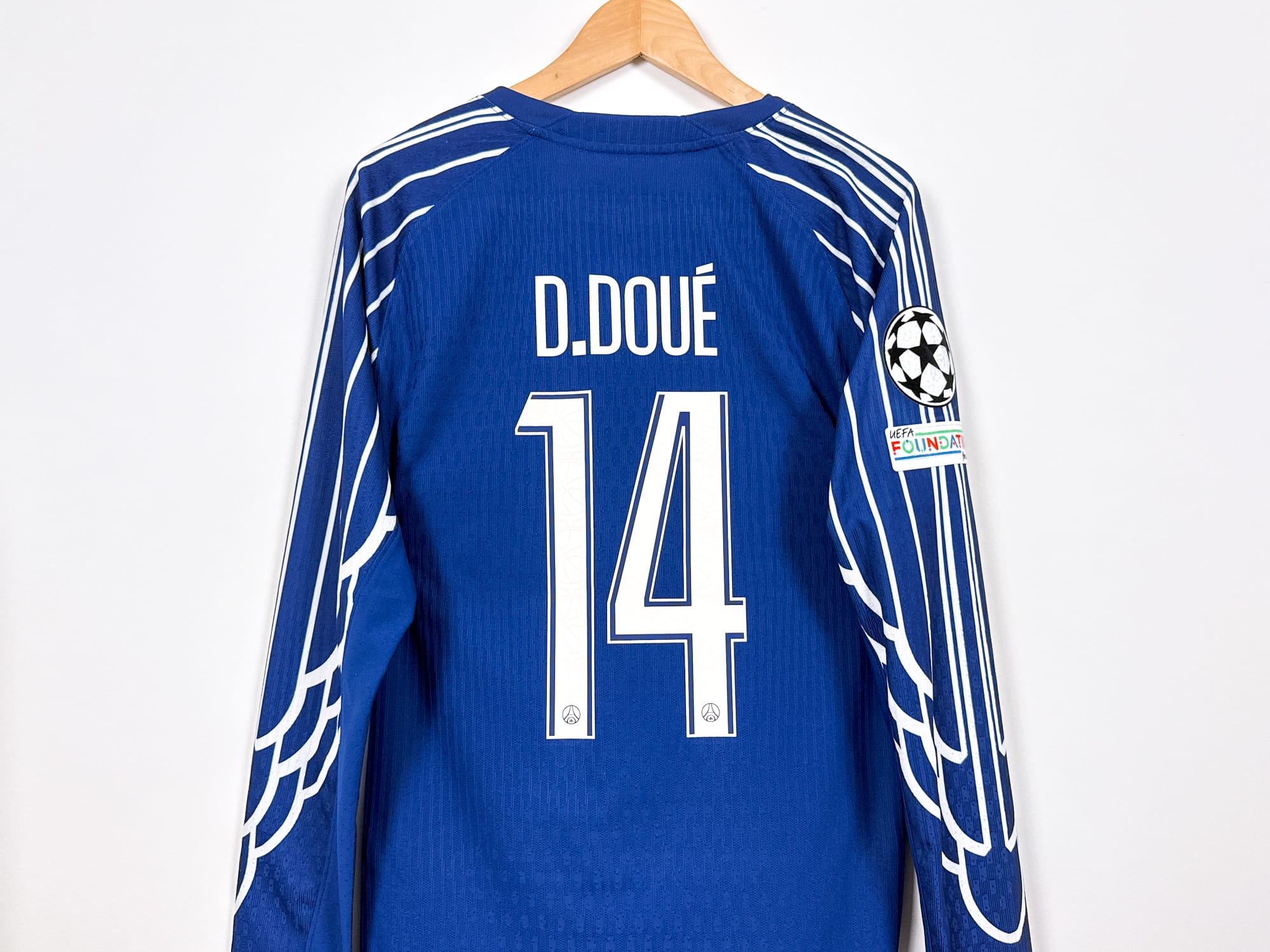 Camiseta D.Doué 14 PSG 2024/2025 Home campeón de la UCL Azul Camiseta D.Doué 14 PSG 2024/2025 Home campeón de la UCL Azul
